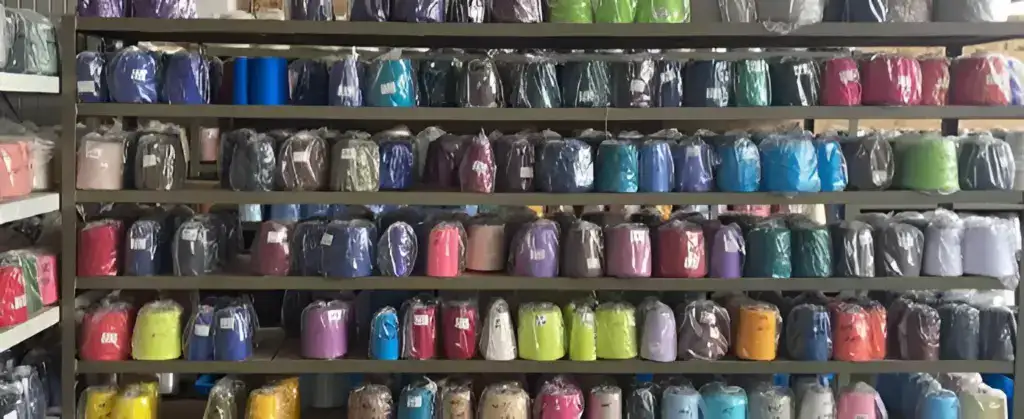 Colorful yarn skeins on display for knitting and crochet projects, showcasing a variety of vibrant shades and textures for crafters and hobbyists.